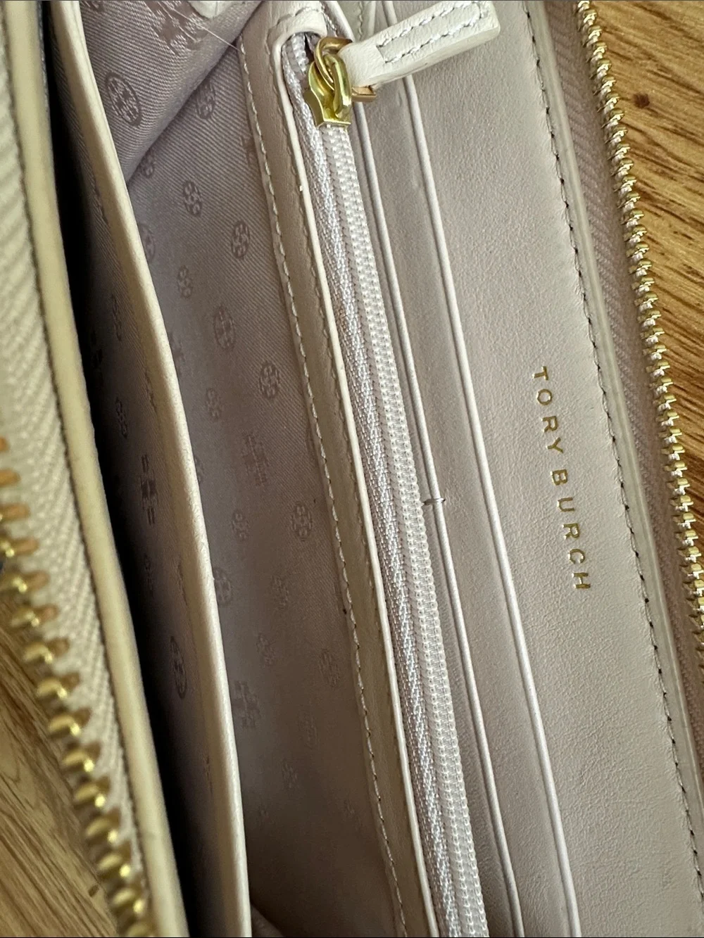 Tory Burch Pebbled Cream Zip-Around Wallet with Gold Logo